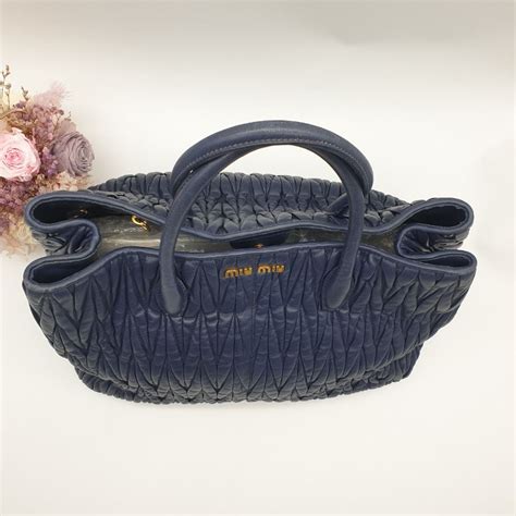 miu miu blue matelasse tote fashionphile